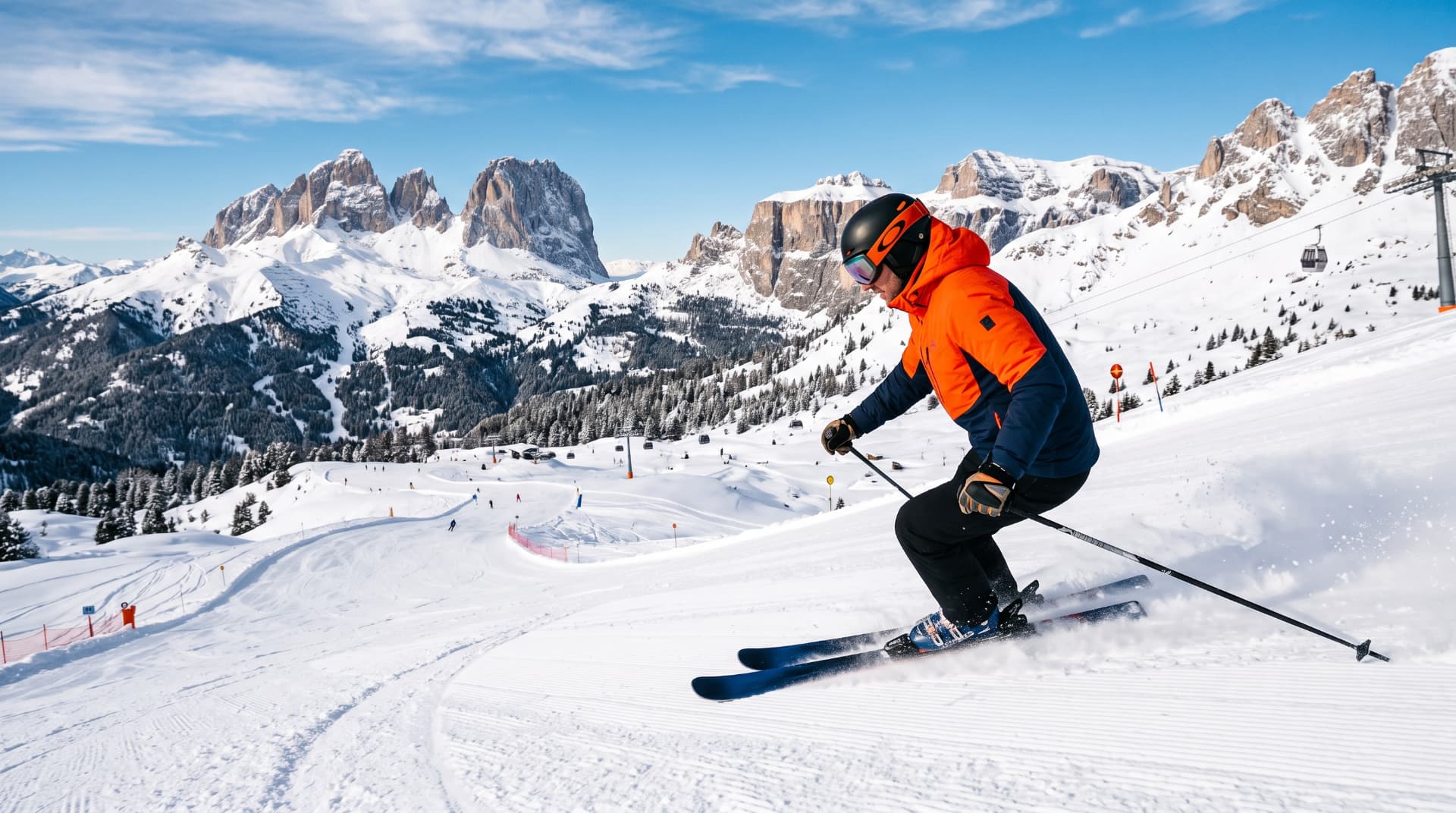 Skier descending a groomed slope beneath the Dolomites